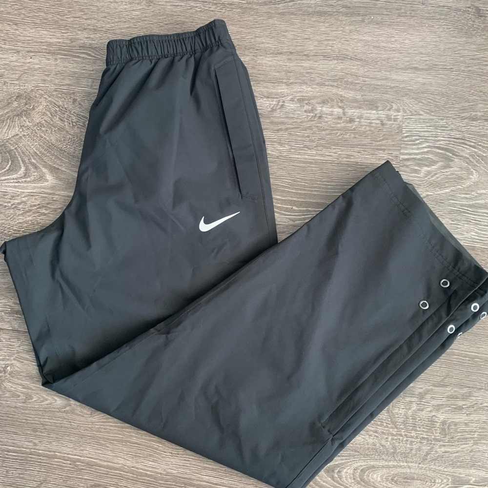 Nike men’s lined Track Pants with White Swoosh Accent